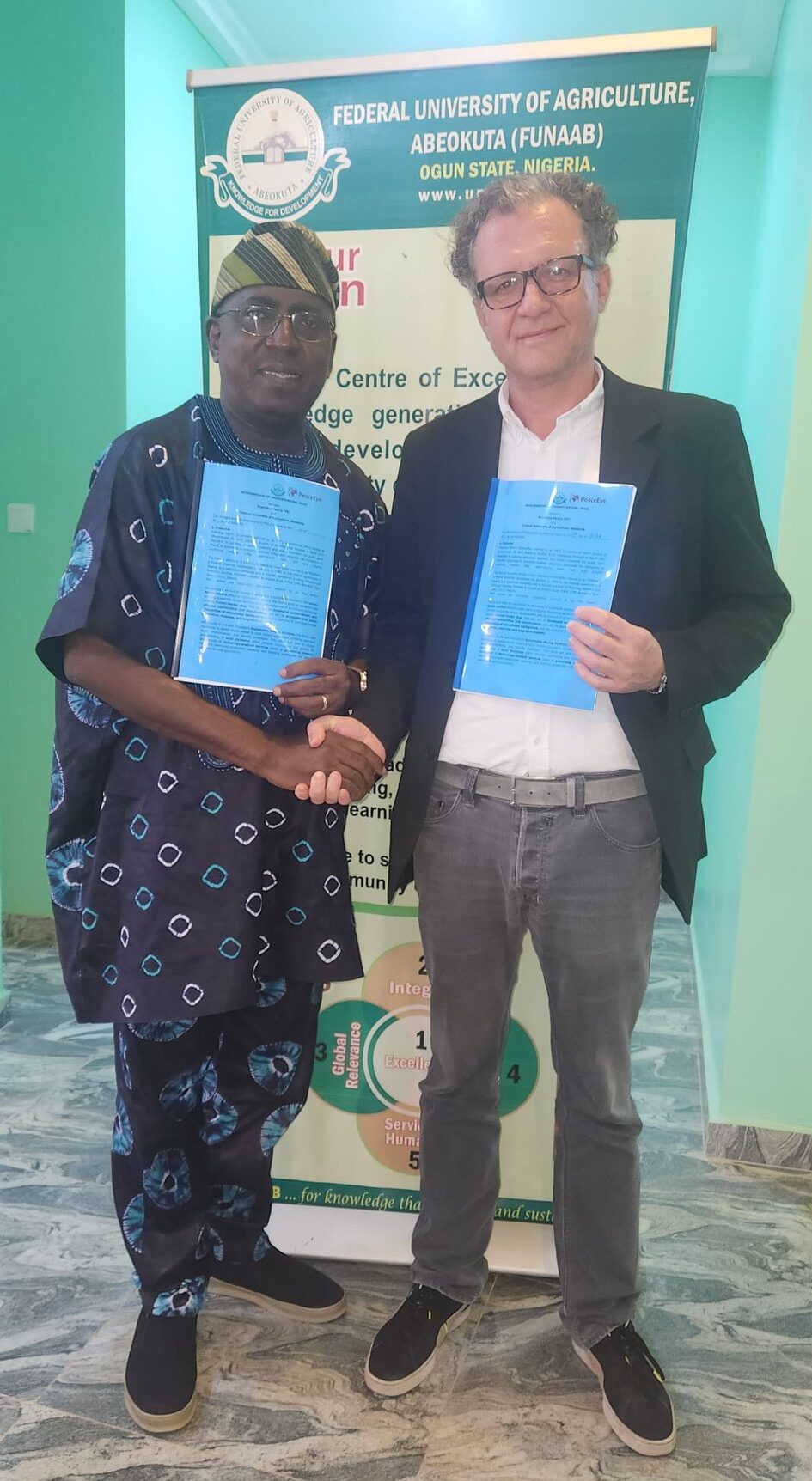 PeaceEye FUNAAB MoU signing PeaceEye CEO and FUNNAB VC